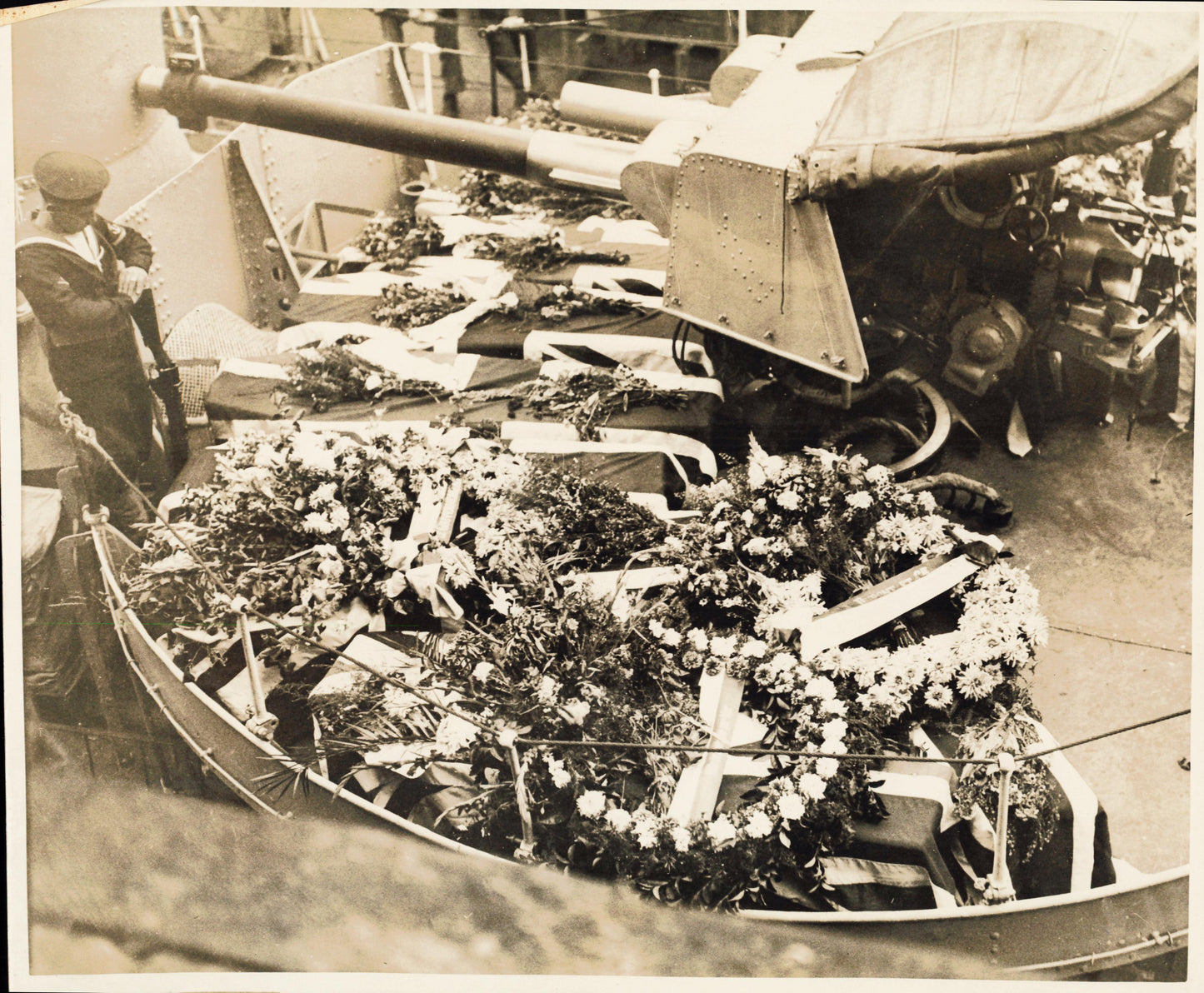 R.101 Victims on deck of H.M.S. Tempest (1930) (vintage oversize print)